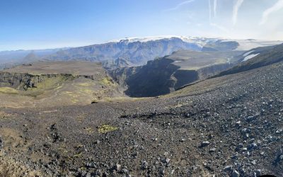 Majestic glacier landscape in Iceland with volcanic terrain and snow-capped mountains.