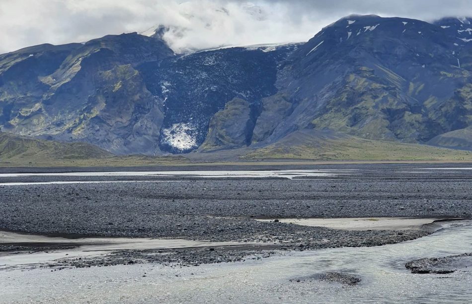 Eyjafjallajökull glacier rising above braided rivers in Þórsmörk Valley on Day 05 of the Laugavegur Trek